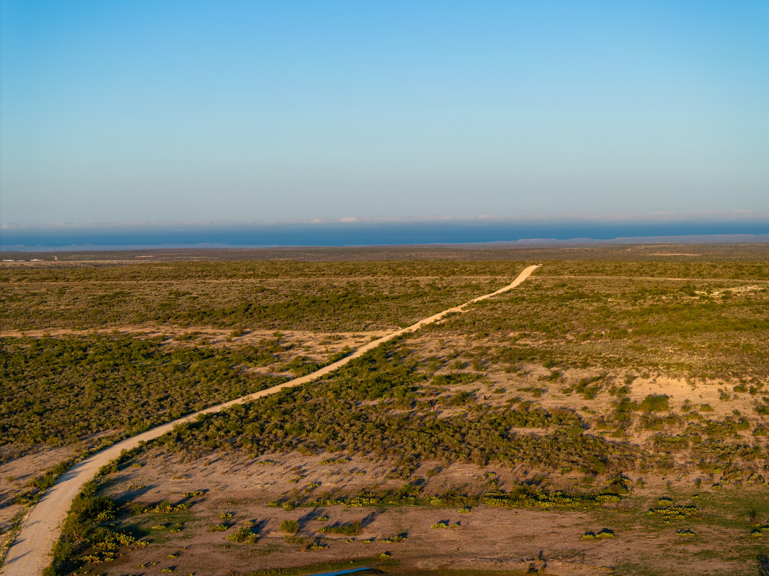 Aerial view of Brother Ranch's rolling terrain